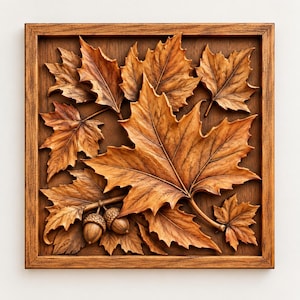 May include: A square wooden wall art piece featuring a detailed relief carving of multiple brown maple leaves and two acorns. The artwork is encased in a matching brown wooden frame, showcasing natural wood grain textures and deep shadows.