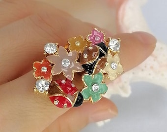 Colorful Enamel Flower and Ladybug Cluster Ring with Crystal Accents in Gold Tone
