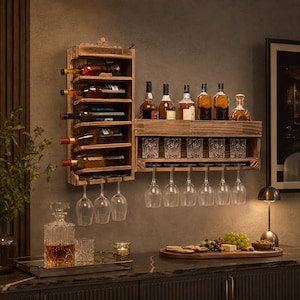 May include: A wall-mounted wooden wine rack system featuring a vertical section with five bottle slots and a horizontal section with a top shelf for bottles, a middle shelf for five glasses, and an underside rack for six hanging wine glasses.
