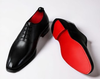 Christian Louboutin Herrenschuhe aus schwarzem Kalbsleder mit roter Sohle