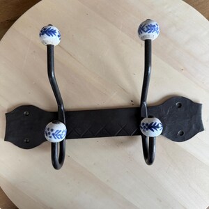Vintage Wrought Iron Wall Coat Rack with Blue and White Floral Ceramic Knobs – Rustic Shabby Chic 4-Hook Entryway Hanger