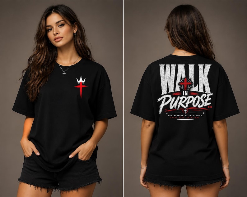 May include: A black short-sleeve t-shirt featuring a small red cross with a white crown graphic on the front left chest. The back displays the text WALK IN PURPOSE in large white letters, a red cross, and smaller text including GOD PURPOSE FAITH DESTINY.