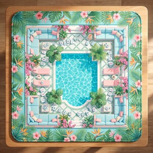 May include: A square mat featuring a top-down view of a swimming pool surrounded by light blue sofas, pink lounge chairs, and scattered mahjong tiles. The border is decorated with tropical palm leaves, hibiscus flowers, and bird of paradise plants.