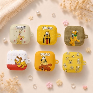 May include: Six square protective cases for wireless earbuds featuring various illustrations of the Disney character Pluto. The cases are colored in shades of cream, yellow, and brown, with some displaying the name Pluto and festive holiday motifs.