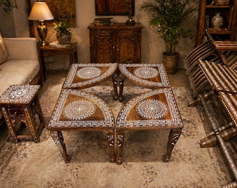 Set di tavolini da caffè salvaspazio con 4 elementi rimovibili.