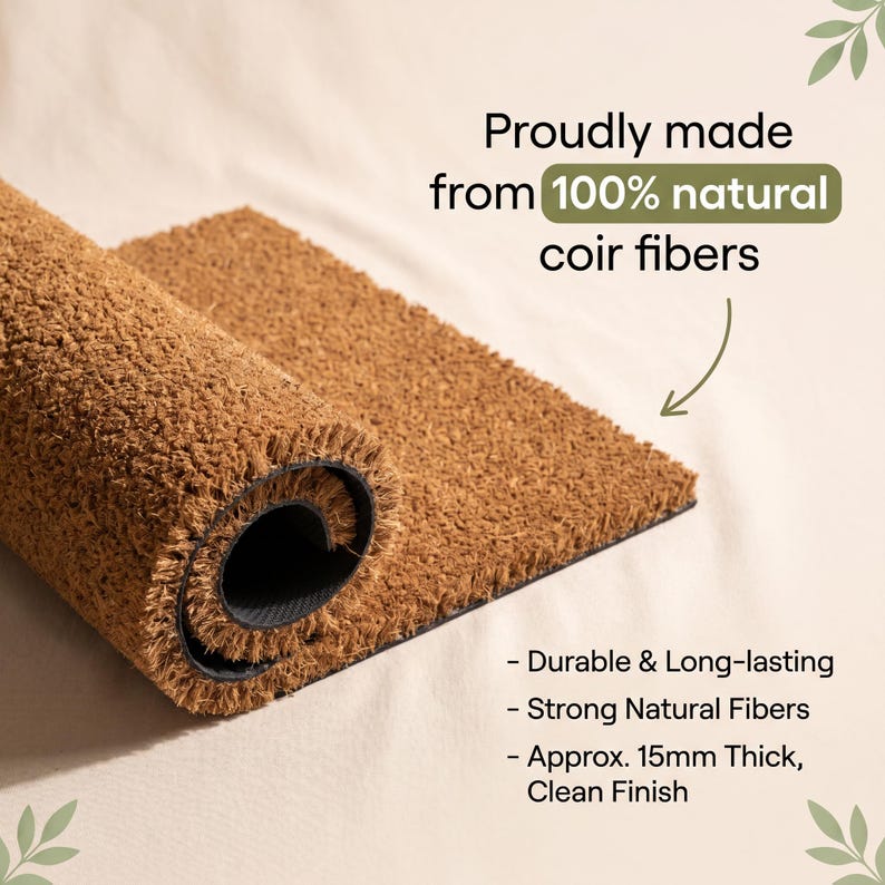 May include: A rolled-up brown coir fiber doormat with the text "Proudly made from 100% natural coir fibers." The mat is approximately 0.6 inches thick and features the text "Durable & Long-lasting", "Strong Natural Fibers", and "Approx. 15mm Thick, Clean Finish."