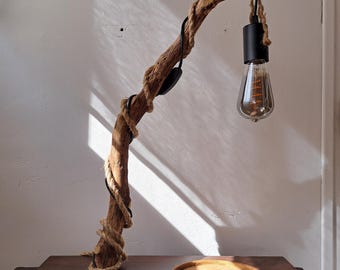 Decorative accent lamp in the shape of a green oak branch