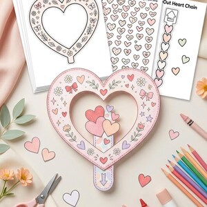 May include: A heart-shaped craft kit with printed paper elements, including a large heart frame, small hearts, and a pull-out heart chain. The kit includes scissors, crayons, and colored pencils, perfect for a Valentine's Day craft project.