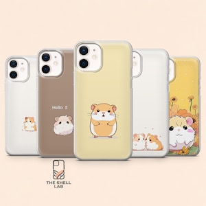 May include: Five clear phone cases featuring various hamster illustrations. One case has a single hamster, another says Hello !! with a hamster, one is yellow with a hamster, one has two hamsters, and one features a hamster with yellow flowers.