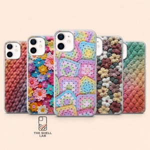 May include: Five smartphone cases featuring various crochet-inspired patterns including pink and orange knit textures, colorful floral motifs, pastel granny squares, dark floral arrangements, and a gradient of textured bobble stitches with The Shell Lab text.