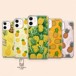 May include: Five smartphone cases featuring various pineapple patterns. The designs include yellow, orange, and light pink backgrounds with illustrated pineapples, leaves, and star shapes. Each case has a dual-camera cutout on the top left corner.