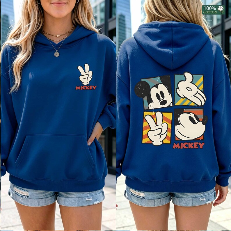 May include: A blue hoodie featuring a Mickey Mouse design. The front displays a peace sign hand gesture and the word "Mickey" in red. The back showcases four Mickey Mouse images. Made of 100% cotton.