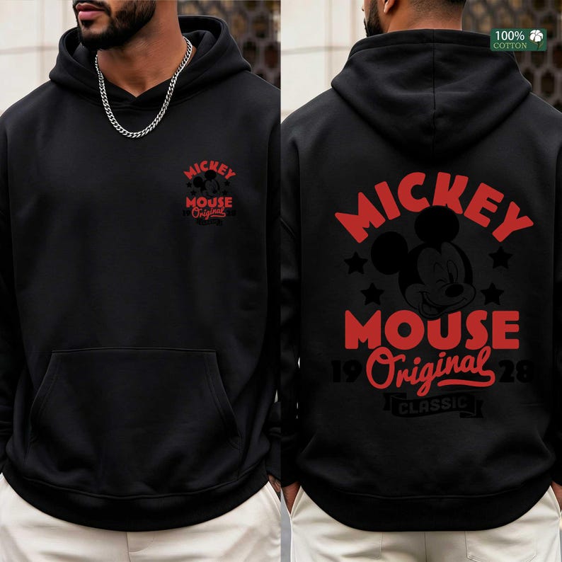 May include: Black hooded sweatshirt with a front pocket and a red Mickey Mouse graphic. The back of the sweatshirt features a larger Mickey Mouse design with the words "Mickey Mouse Original" and "Classic". Made of 100% cotton.