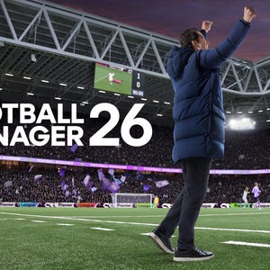 May include: A football stadium scene with the text "FOOTBALL MANAGER 26". A person in a blue coat celebrates on the pitch. The stands are packed with fans. A football is visible on the green grass.