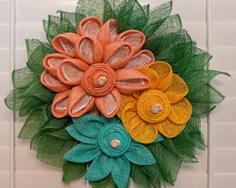 Spring triple flower wreath with large button seashell centers