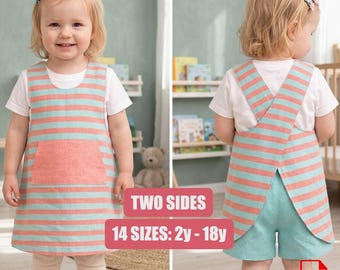 May include: A reversible pinafore dress featuring horizontal coral and light blue stripes with a front pocket. The back view shows a cross-back design worn over shorts. The text on the image reads TWO SIDES and 14 SIZES: 2y - 18y, with a PDF icon.