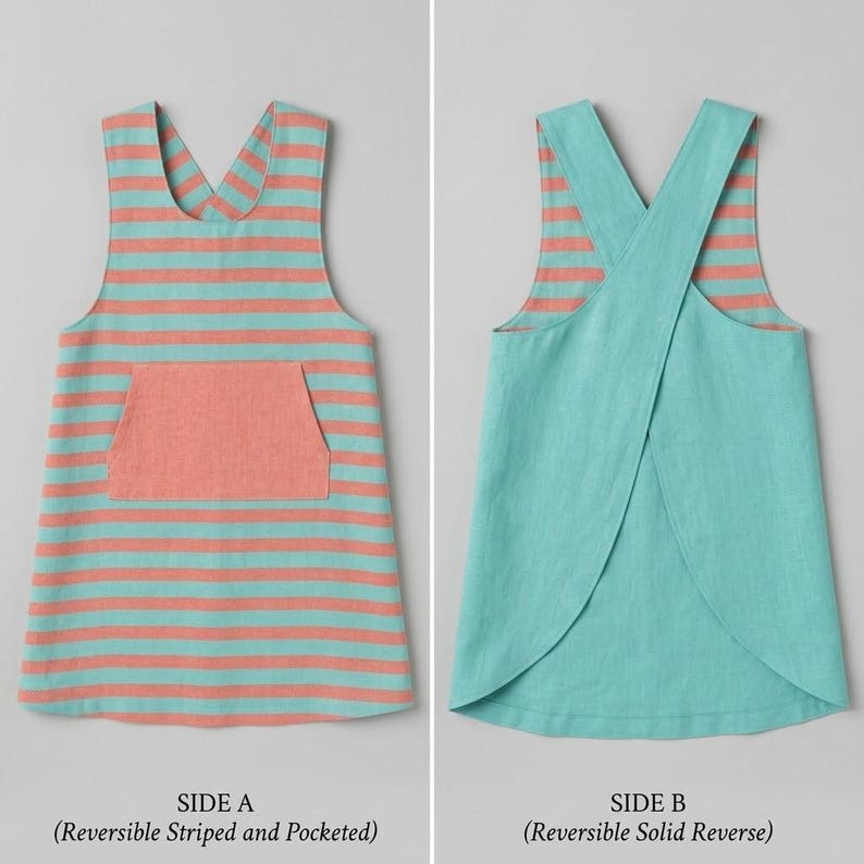 May include: A reversible apron featuring two distinct sides. Side A displays horizontal coral and teal stripes with a central coral pocket. Side B shows a solid teal color with a cross-back design. The text labels SIDE A and SIDE B are visible.