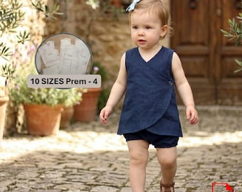 May include: A toddler wearing a navy blue wrap-style top and matching shorts. The outfit has a button closure and a V-neck design. The image also shows a pattern with the text "10 SIZES Prem - 4".