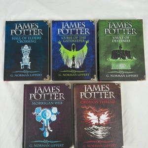 May include: A collection of five hardcover books titled James Potter by G. Norman Lippert. The titles include Hall of Elders' Crossing, Curse of the Gatekeeper, Vault of Destinies, Morrigan Web, and Crimson Thread, each featuring unique cover art.