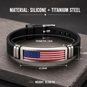 May include: A black silicone and titanium steel bracelet featuring a rectangular metal plate with a United States flag graphic. The bracelet has a perimeter of 23 cm, a plate width of 42.0 mm, a plate height of 12.0 mm, and a weight of 20.0 g.