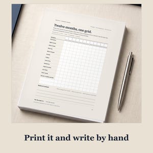 A stack of printed kit pages on a linen desk beside a steel pen, with the blank twelve month symptom timeline on top. Caption: "Print it and write by hand". The desk photo is AI-generated.