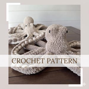 May include: Two plush, crocheted octopus toys in shades of gray and beige. The text "CROCHET PATTERN" is displayed across the bottom of the image. The octopuses have large, round heads and long, textured tentacles.