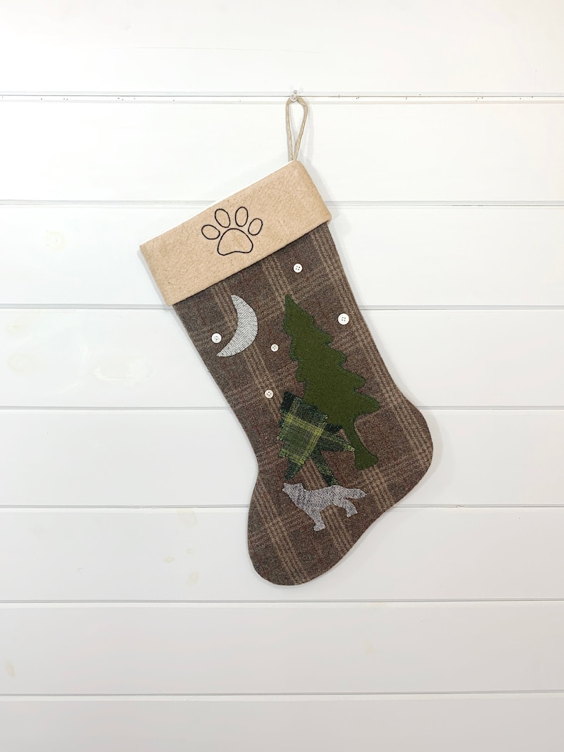 wool fabric christmas stocking, brown plain wool fabric, wolf howling at the moon, pine trees, buttons as snowflakes, paw print christmas stocking, rustic christmas stocking, dog christmas stocking, woodland christmas