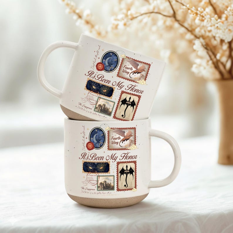 May include: Two stacked off-white ceramic mugs with a speckled finish and a tan base. The design features the text "It's Been My Honor" alongside postage stamp-style illustrations of a dragon, a castle, glowing eyes, and a moon, with red wax seals.