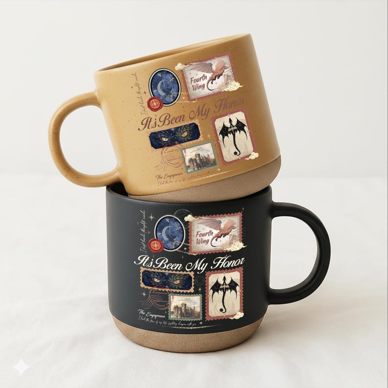 May include: Two ceramic mugs, one tan and one black, each featuring a graphic design with the text "It's Been My Honor," "Fourth Wing," and "The Empyrean." The design includes illustrations of a dragon, a castle, and eyes, with a speckled finish.