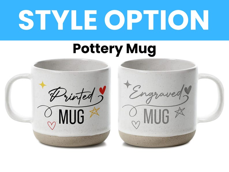 May include: Two white speckled pottery mugs with a handle. The left mug features black text reading Printed MUG with red and yellow stars and hearts. The right mug features grey text reading Engraved MUG with grey stars and hearts. Both have a tan base.