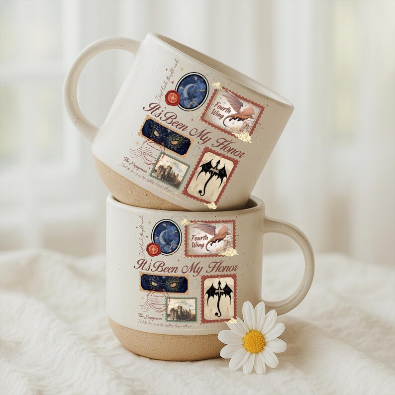 May include: Two off-white ceramic mugs with a speckled texture and a tan base. The mugs feature a graphic design with the text 'It's Been My Honor' and 'Fourth Wing', alongside illustrations of a dragon, a castle, and a moon in a stamp style.