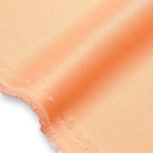 Interlockgebreide voeringstof 3 oz 70 denier lichtgewicht stretch polyester op maat gesneden voor het naaien van kleding, accessoires, decoratie en meer Perzik