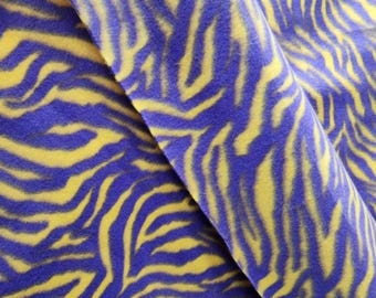 GIALLO/VIOLA - Stampa zebrata - Materiale in pile morbido e anti-pilling, venduto tagliato su misura.
