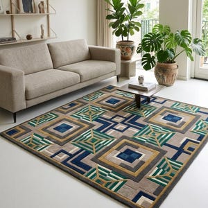 May include: A rectangular area rug featuring a geometric pattern of squares and lines in shades of navy blue, forest green, mustard yellow, and beige. The design consists of repeating nested square motifs and angular linear accents on a neutral background.