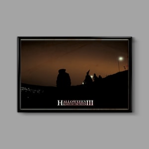May include: A vintage-style poster for the movie Halloween III: Season of the Witch. The poster features a dark brown background with a silhouette of a group of people walking towards a city in the distance. The title of the movie is written in white text with a pink outline.