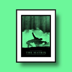 Peut inclure: Une affiche verte et noire avec la silhouette d'une personne sautant devant un fond de pluie numérique vert. L'affiche porte le titre "THE MATRIX" et les noms des acteurs : Keanu Reeves, Laurence Fishburne, Carrie-Anne Moss, Hugo Weaving.