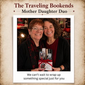 May include: A photograph of two women smiling, holding a gift box. The box is wrapped in red and white paper and tied with a red ribbon. The box contains cards and a book. The image includes the text "The Traveling Bookends Mother Daughter Duo" and a message.