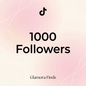 May include: A digital graphic with a TikTok logo and the text "1000 Followers" in bold black font. The background is a gradient of pink and white with abstract white lines and the text "Glamora Finds" at the bottom.