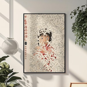 Puede incluir: P&oacute;ster enmarcado con una escena de la pel&iacute;cula de animaci&oacute;n El viaje de Chihiro. La obra de arte representa a una joven rodeada de numerosos p&aacute;jaros de papel blancos. Texto japon&eacute;s visible en el lado izquierdo del p&oacute;ster. El p&oacute;ster est&aacute; en una pared blanca.