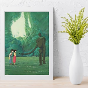 May include: A framed art print featuring an animated scene of two figures standing before a large, dark green robot in a grassy field. The background shows a bright, light-filled forest opening. The frame is white and rectangular in shape.
