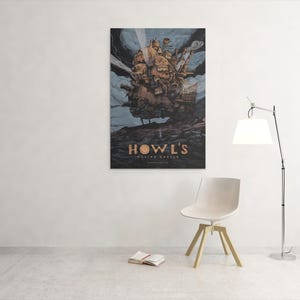 May include: A framed poster of Howl's Moving Castle hangs on a white wall. The artwork depicts the castle in a cloudy sky. Below the castle is the title "Howl's Moving Castle" in gold lettering. A white chair and a floor lamp are in front of the wall.