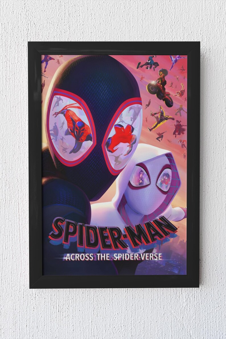 May include: A framed poster featuring characters from the animated film "Spider-Man: Across the Spider-Verse." The poster showcases Spider-Man and Spider-Gwen, with the film's title prominently displayed. The background features various other Spider-Man characters.