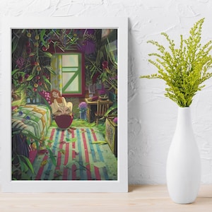 May include: A framed art print of a room filled with lush greenery and a person sitting on a red object. The room has a window with a green frame, a striped rug, and a bed with a patterned quilt. A white vase holds green plants.