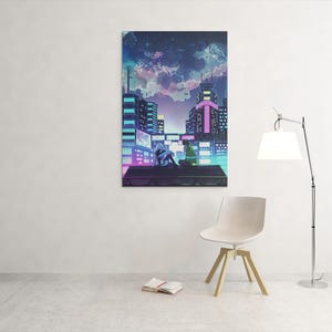May include: A vertical canvas print showing a futuristic cityscape at night. The artwork features a person sitting on a rooftop, with neon-lit buildings and a colourful sky. The print is mounted on a white wall.