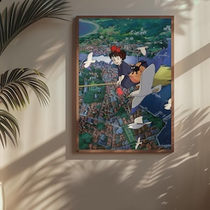 May include: A framed art print featuring a scene from an animated film. The artwork depicts a young girl with a red bow flying on a broom over a city, accompanied by a black cat and seagulls. The print is in a wooden frame.
