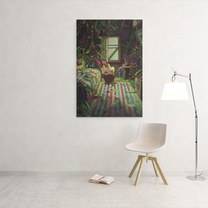 May include: A framed art print depicts a serene interior scene. A person is seated near a window, surrounded by lush greenery. A striped rug and a bed with a patterned cover are visible. A white chair and a floor lamp are in the foreground.