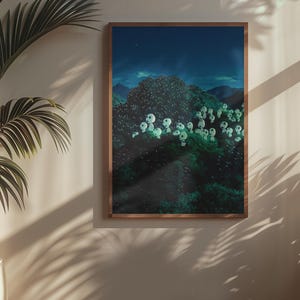 May include: A framed art print depicts a surreal landscape with a dark blue sky and a forest of green foliage. The artwork features numerous white, glowing, skull-like shapes. The frame is a warm brown color, and the scene is illuminated by sunlight.