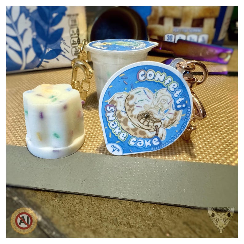 Llavero antiestrés con forma de taza de pudín de confeti imagen 6