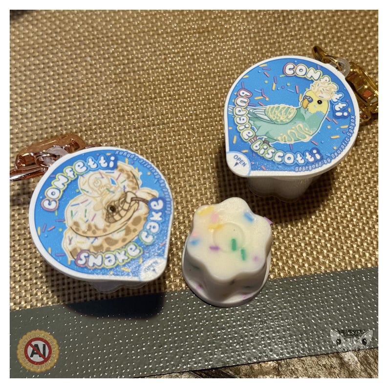 Llavero antiestrés con forma de taza de pudín de confeti Full Set