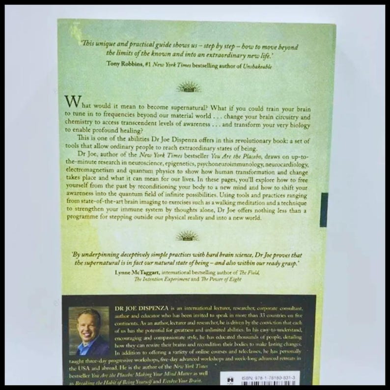 May include: A book cover with a light green background and text. The cover features quotes from Tony Robbins and Lynne McTaggart. The author's photo is at the bottom. The book is about neuroscience and transformation. Measurements are not applicable.